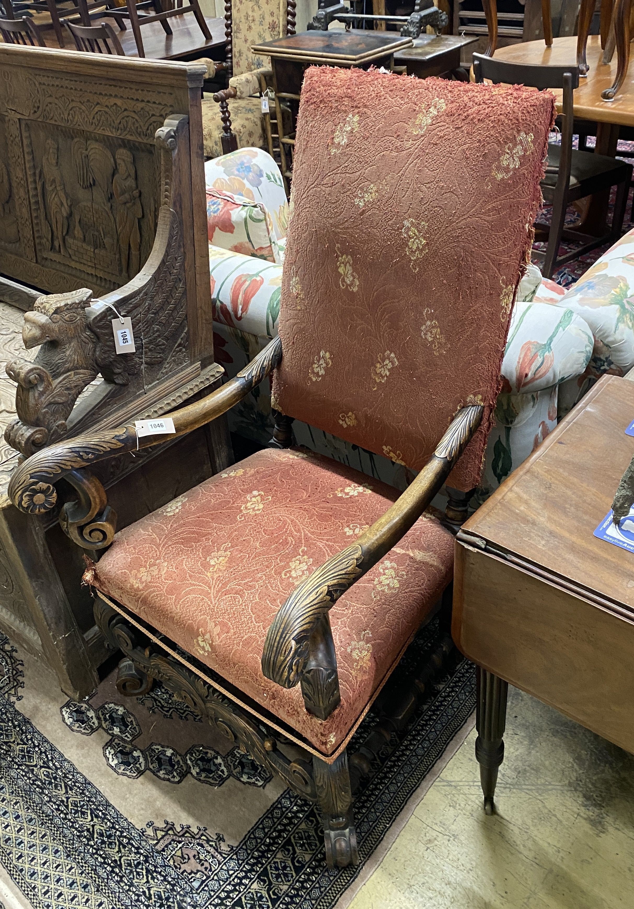 An 18th century style carved walnut elbow chair, width 64cm, depth 62cm, height 116cm